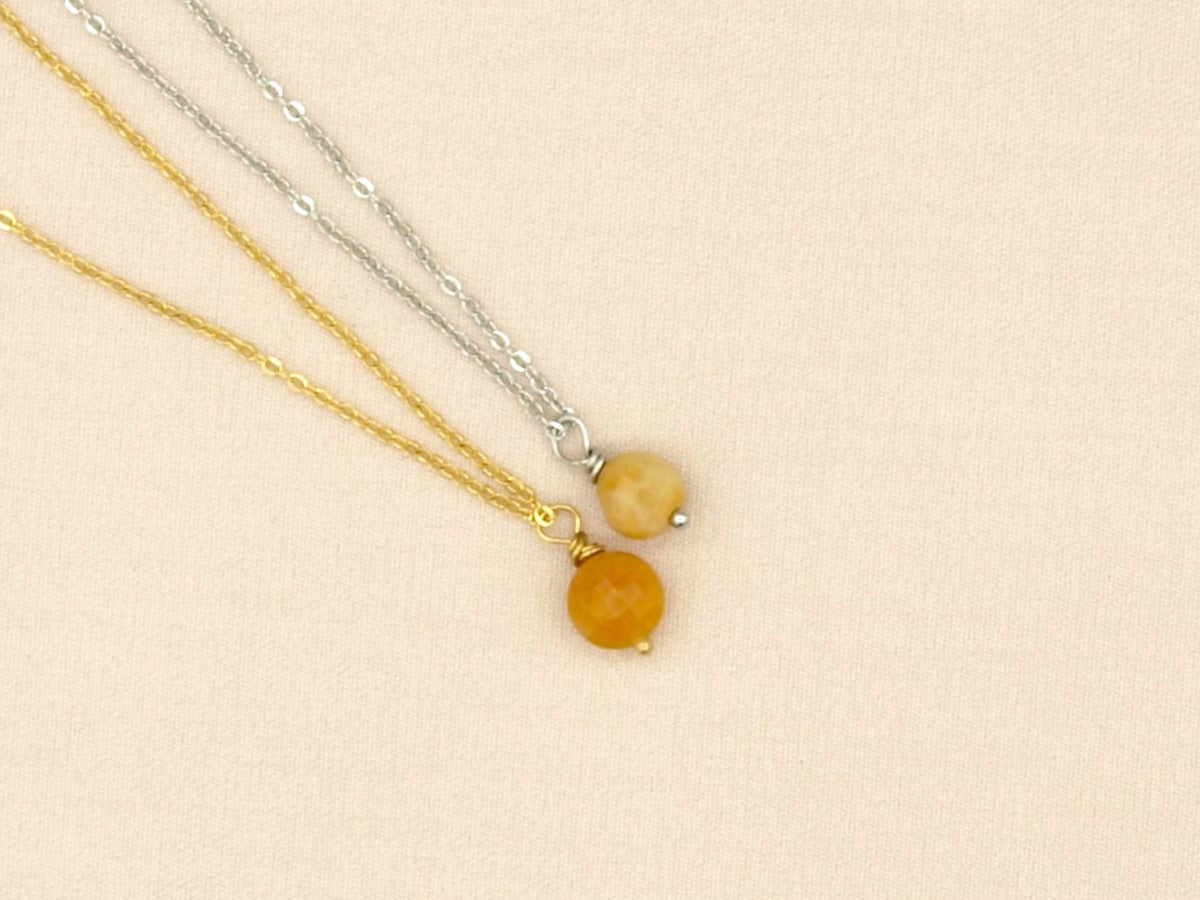 Necklace rock, yellow aventurine, silver and gold stainless steel