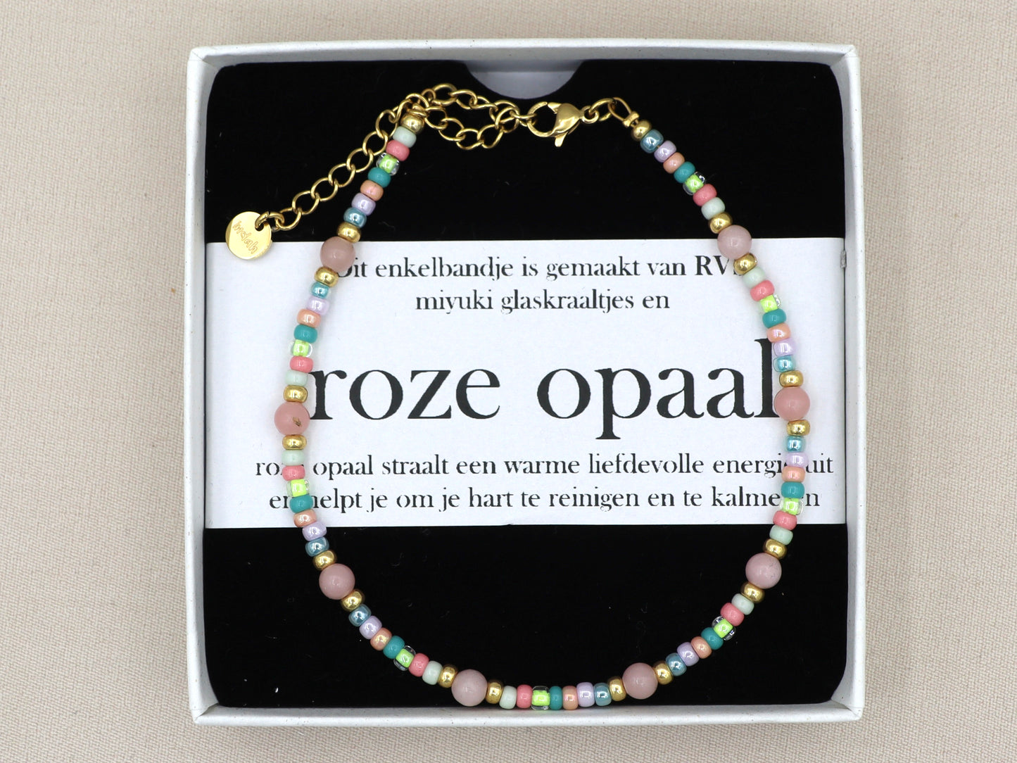 Enkelbandje roze opaal, zilver of goud rvs