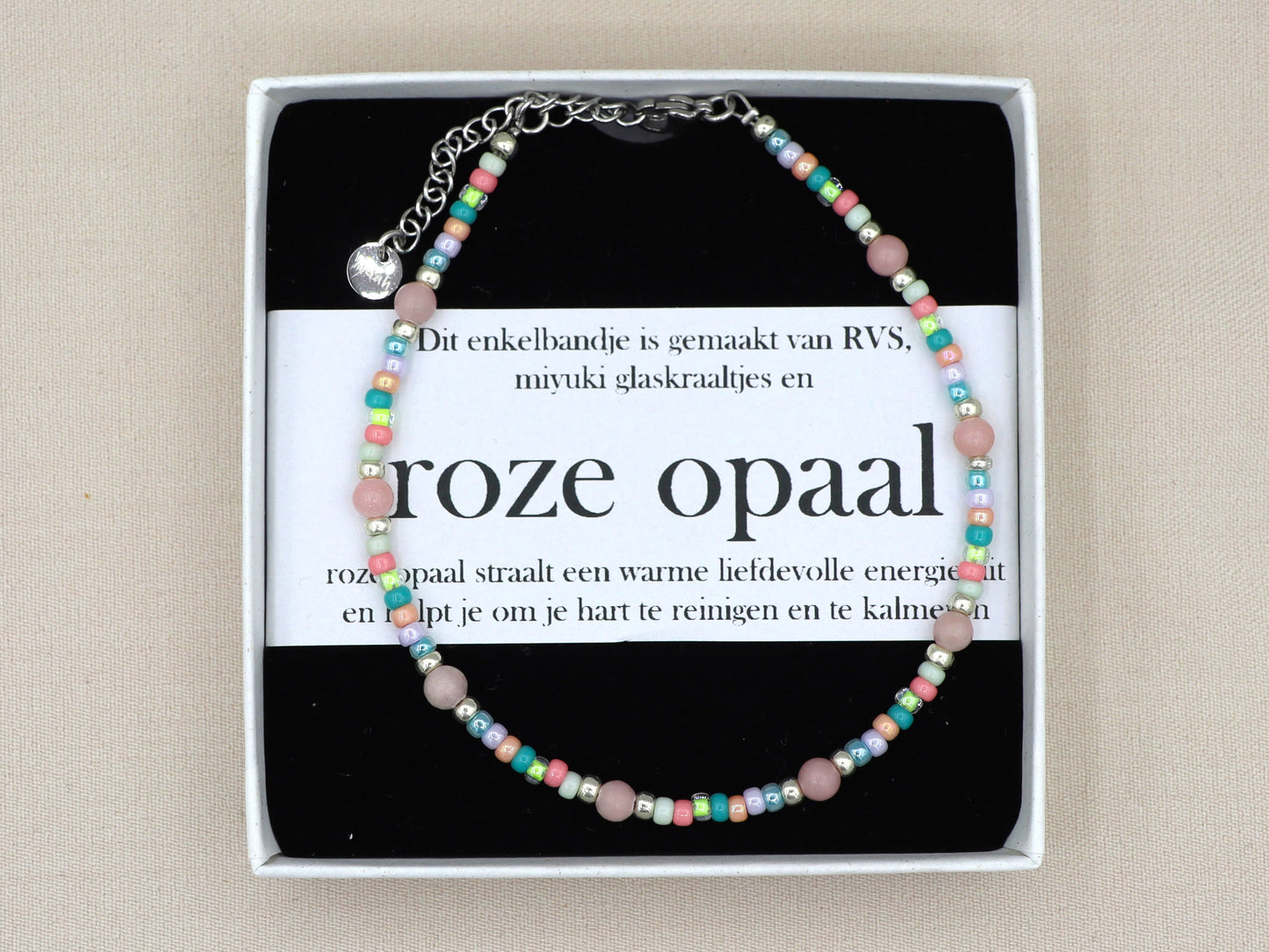 Enkelbandje roze opaal, zilver of goud rvs